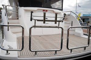 Stainless stern rail with bait board mounts