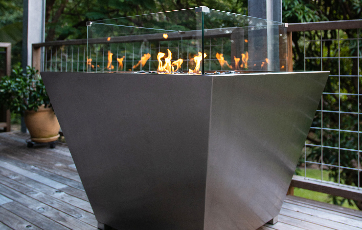Square stainless gas fire pit with black pebbles made in Australia