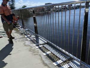 Cleaning outdoor stainless baustrade, Thomas Drive Bridge Surfers Paradise QLD